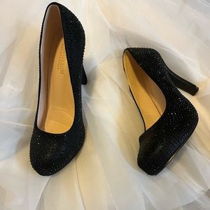 Black beaded high heel shoes, closed toe